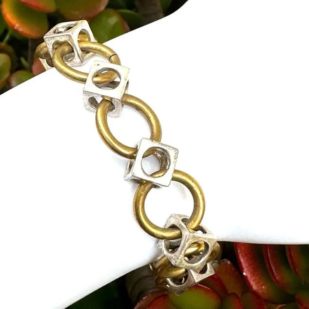 Silver plated  and gold tone link bracelet